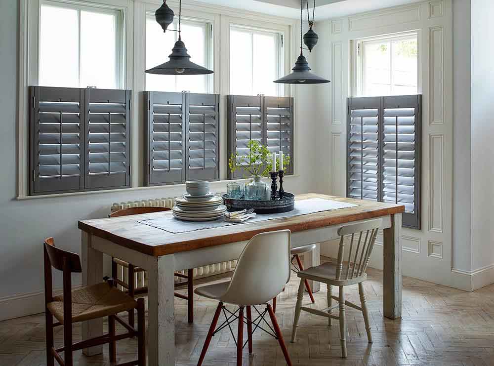norman cafe style shutters in a dining area